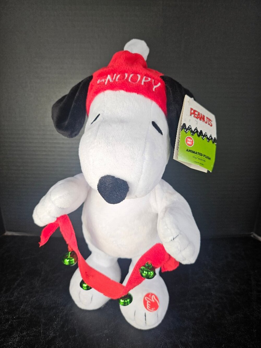 Dan Dee Peanuts Snoopy Holiday Animated Plush Holding Red Ribbon With Bells
